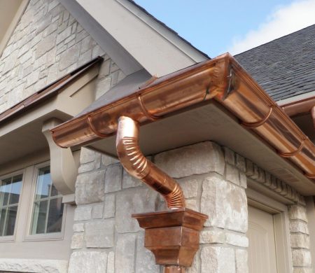 homeguide-up-close-view-of-sectional-copper-gutters-installation